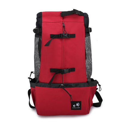 PawTrek™ Dog Carrier Backpack with a small dog being carried comfortably by a person outdoors, ideal for travel.