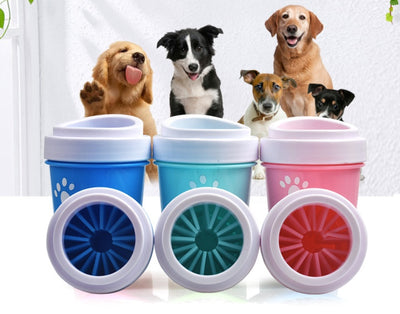 Dog paw washer in various colors with happy dogs in the background, perfect for easy paw cleaning.