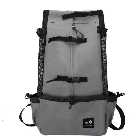 PawTrek™ Dog Carrier Backpack with a small dog being carried comfortably by a person outdoors, ideal for travel.