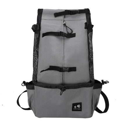 PawTrek™ Dog Carrier Backpack with a small dog being carried comfortably by a person outdoors, ideal for travel.