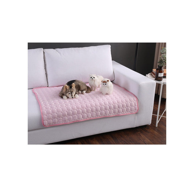 Premium Pet Cooling Mat - Pink Edging - lifestyle with dogs on sofa