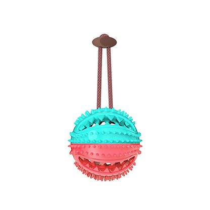Suction Cup Dog Toy featuring a dog chewing on a tugging toy anchored with a strong suction cup for interactive play.