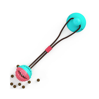 Suction Cup Dog Toy featuring a dog chewing on a tugging toy anchored with a strong suction cup for interactive play.